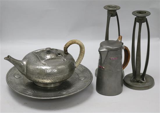A Liberty & Co English pewter enamelled jug, a pair of similar candlesticks, teapot and tazza